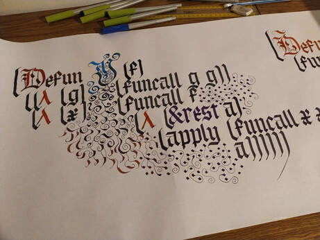A WIP piece of calligraphy depicting a Lisp implementation of the Y combinator, with partial flourishing